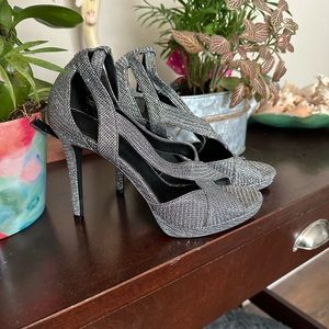Gorgeous Silver Michael Kors platform heels. Size 6.5